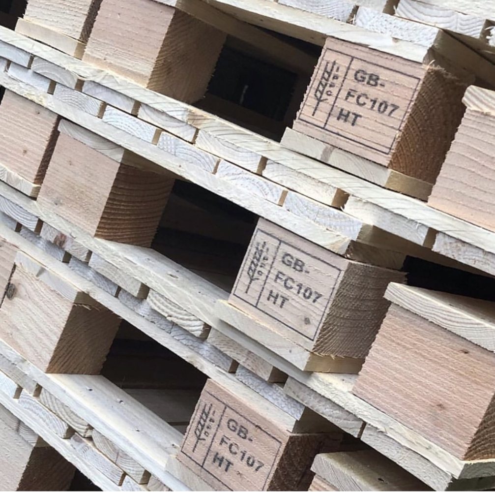 Heat treated wooden pallets carrying GB FC 107 IPPC markings